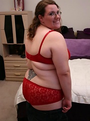 Sweet looking bbw Lorelie strips off her clothes and spreads her fat cunt to take cock pounding in her slit